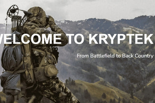 A hunter wearing Kryptek's unique, tactical-inspired camouflage pattern in a rugged environment.